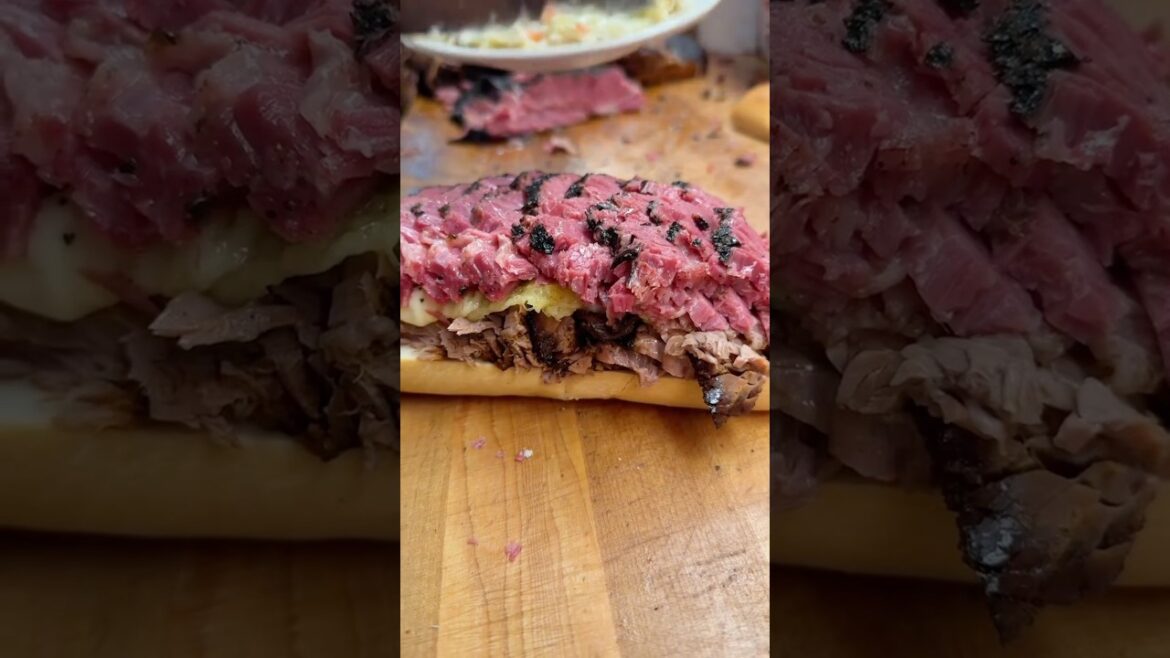 Reuben sandwich with beef brisket, pastrami, Swiss cheese, and mustard #brisket #pastrami #sandwich