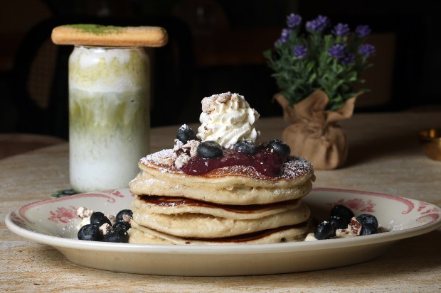 Blueberry pancakes topped with berry compote, candied pecans, and Grand Marnier citrus mascarpone are served at Cafe Bastille in the Weston Town Center, Thursday, Jan. 15, 2026. (Mike Stocker/South Florida Sun Sentinel)