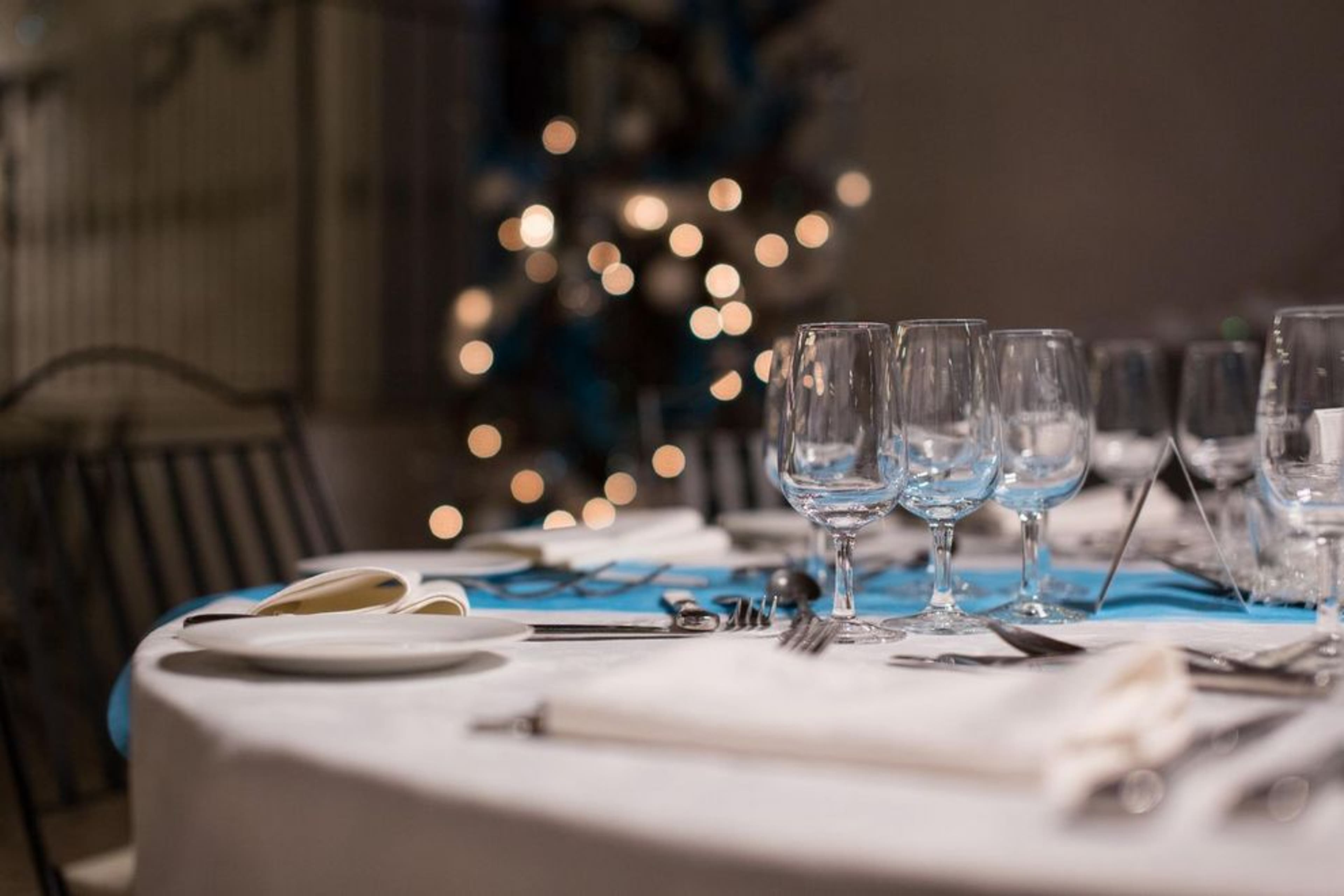 The Christmas table is set in white