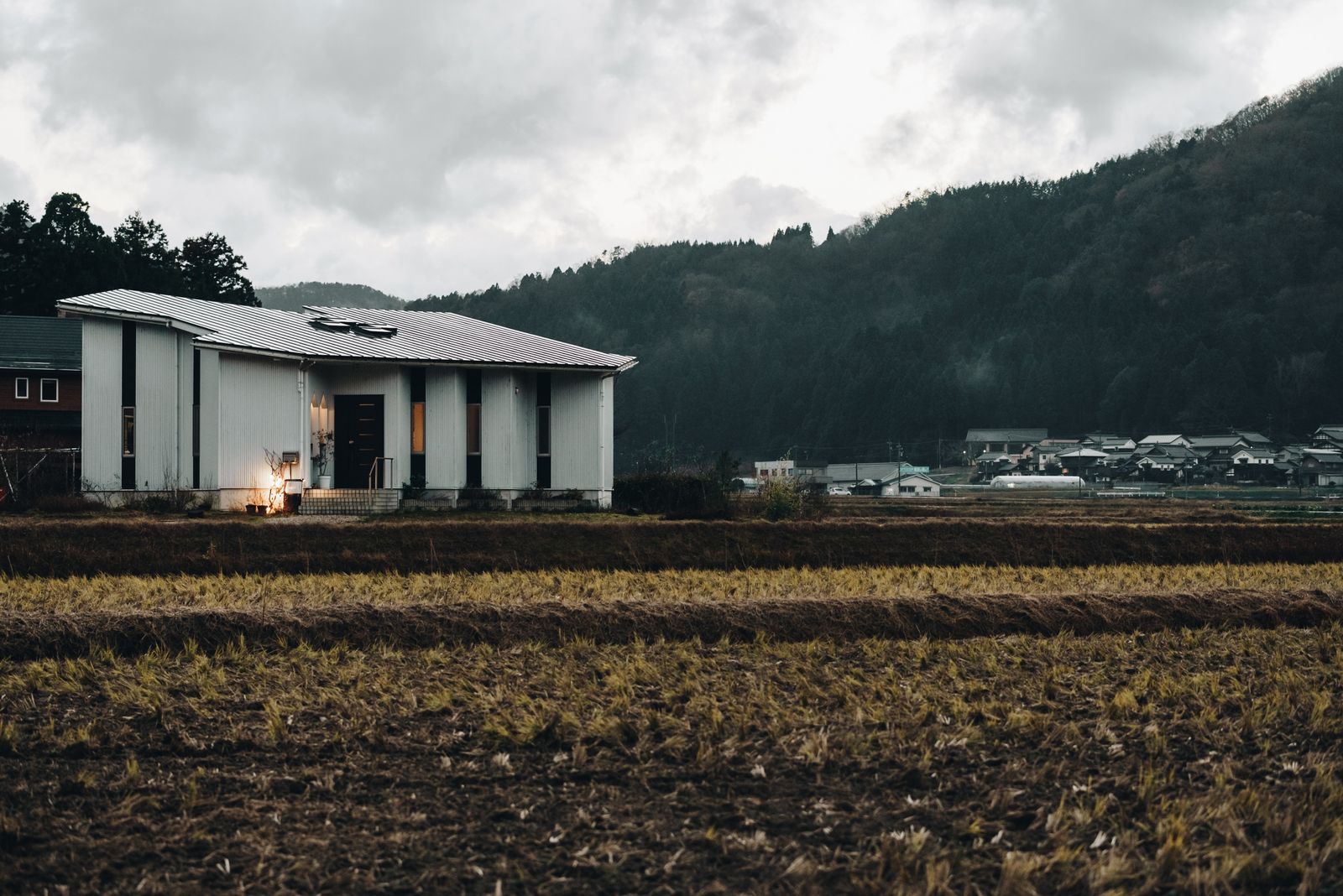 Image may contain Outdoors Nature Countryside Architecture Building Hotel Housing Rural Ground and Car