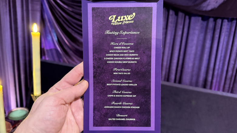A purple printed menu featuring the Luxe Value Menu