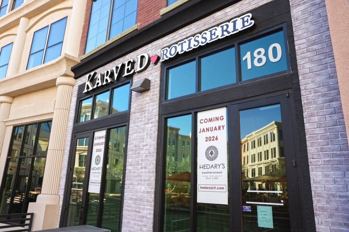 Signs announcing the opening date of Hedary's Mediterranean are seen on the exterior of the res ...