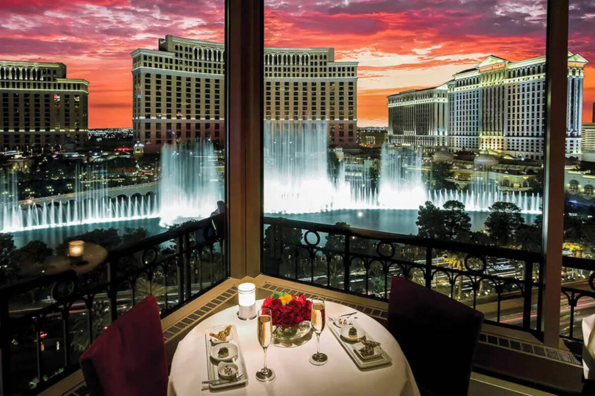 Eiffel Tower Restaurant at Paris Las Vegas on the Strip overlooks the Fountains of Bellagio acr ...