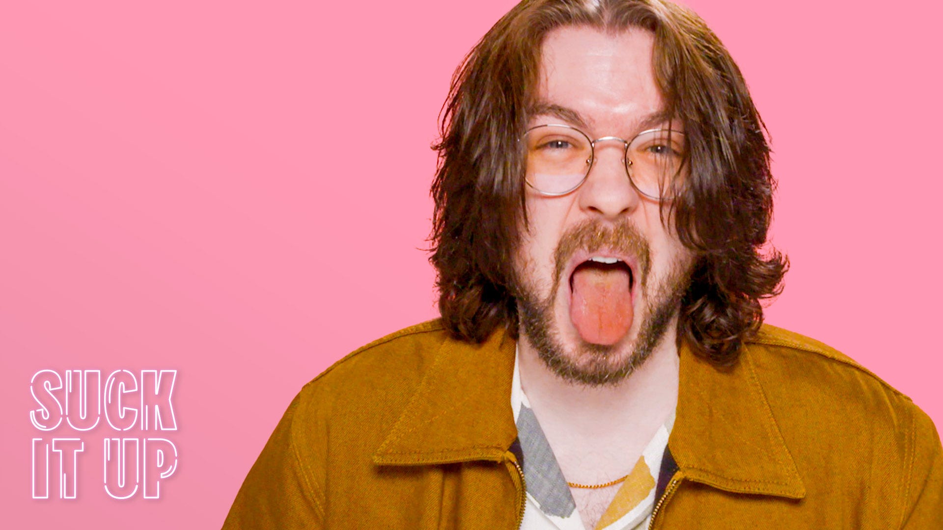 various bottles and cans of extra virgin olive oil arranged on a kitchen countertop