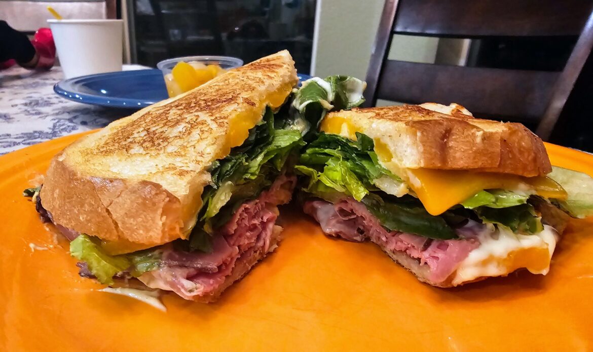 Roast Beef, Dijon Mustard, Mayo, Romaine Lettuce and Cheddar on Sourdough Bread.