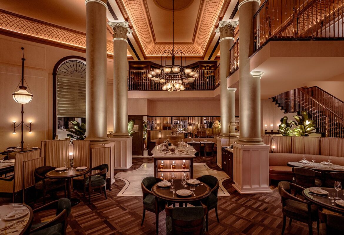 interior of Mezzogiorno by Afroditi in moody light and warm red and brown tones