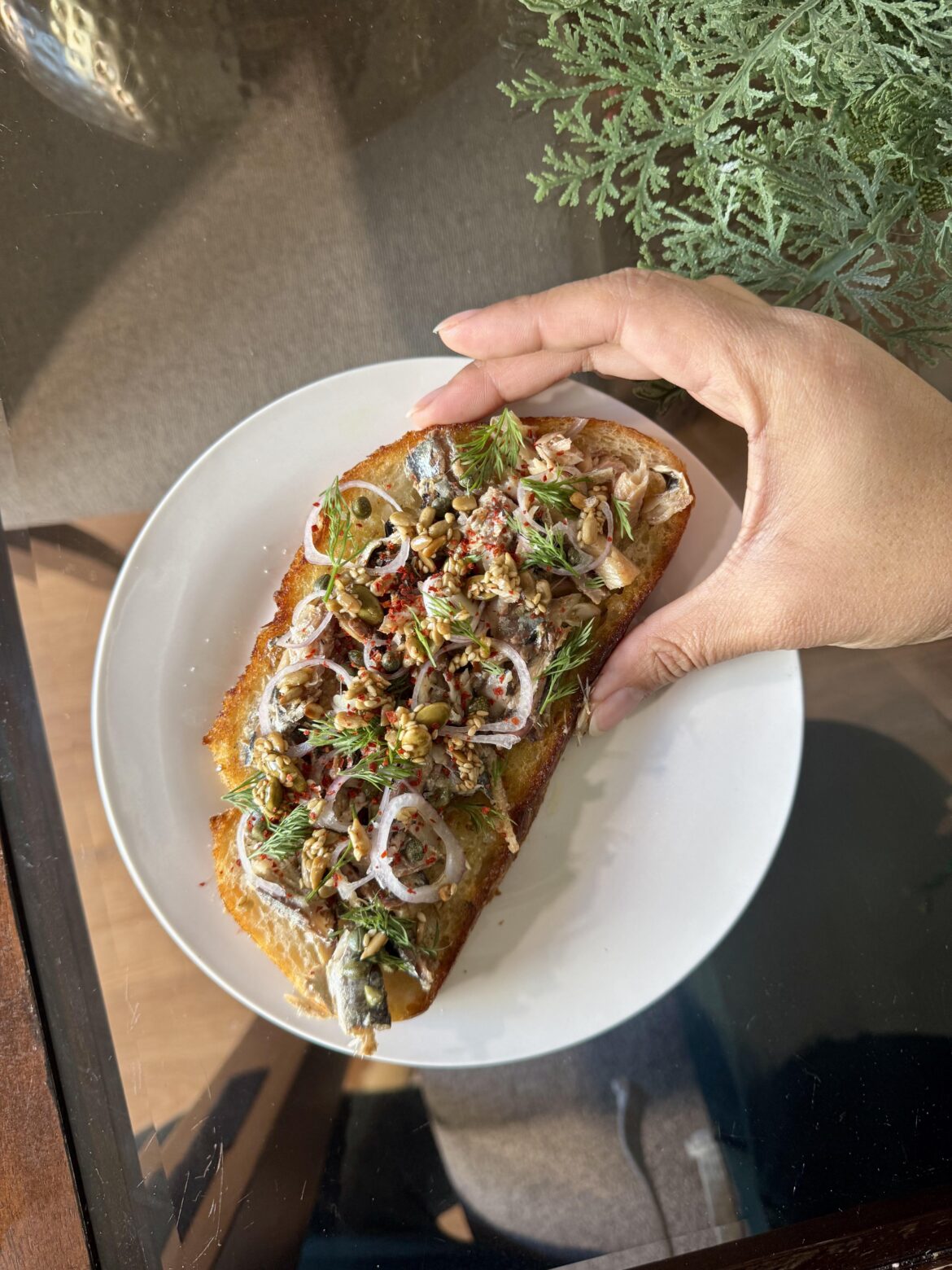 Building a pretty sardine toast is a lovely morning ritual
