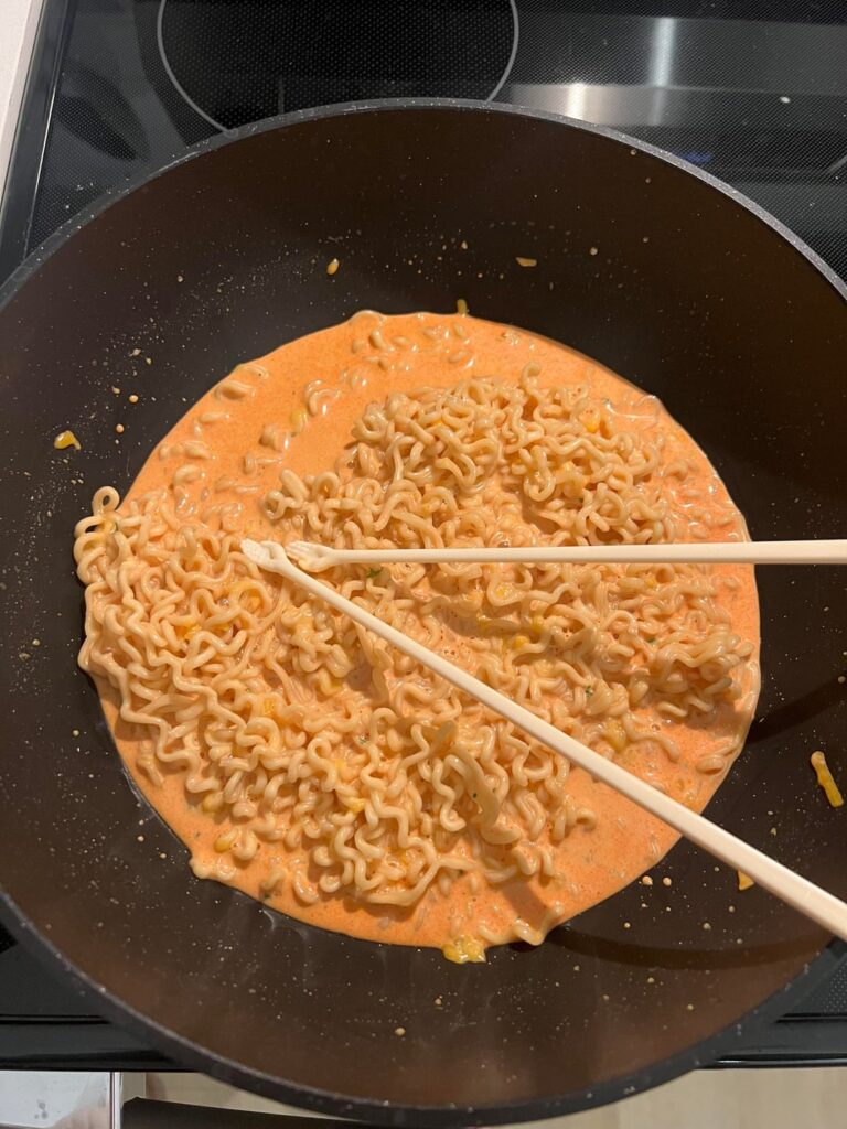 Creamy Rosé Buldak w/ these chopsticks my parents got me for Christmas…