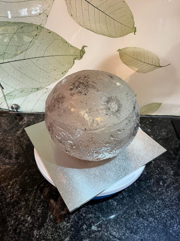 Planet-themed cake for my little brother