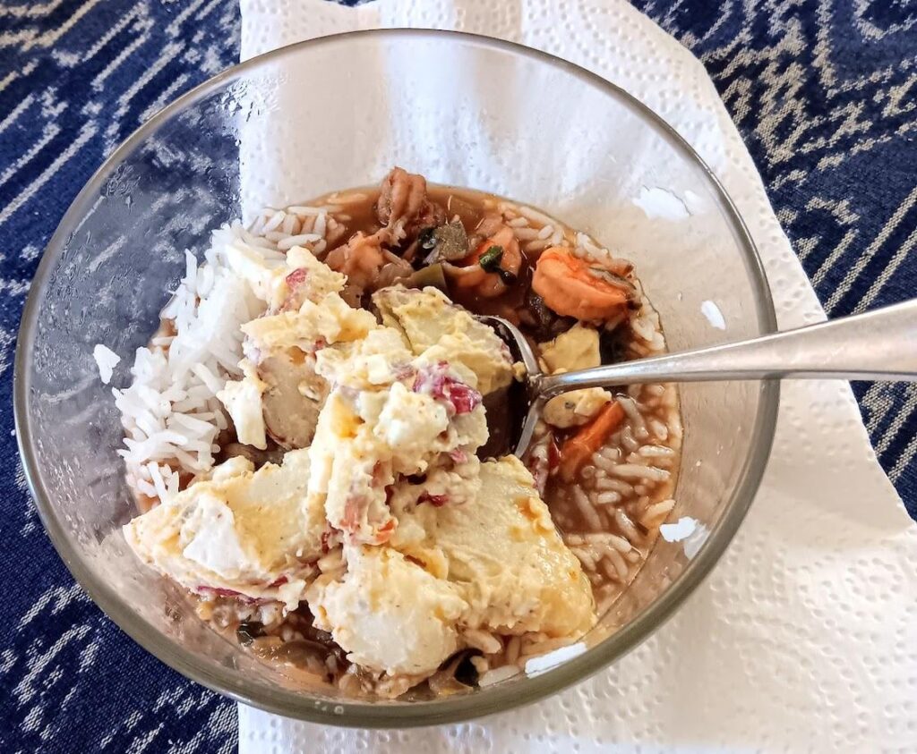 homemade gumbo with potato salad