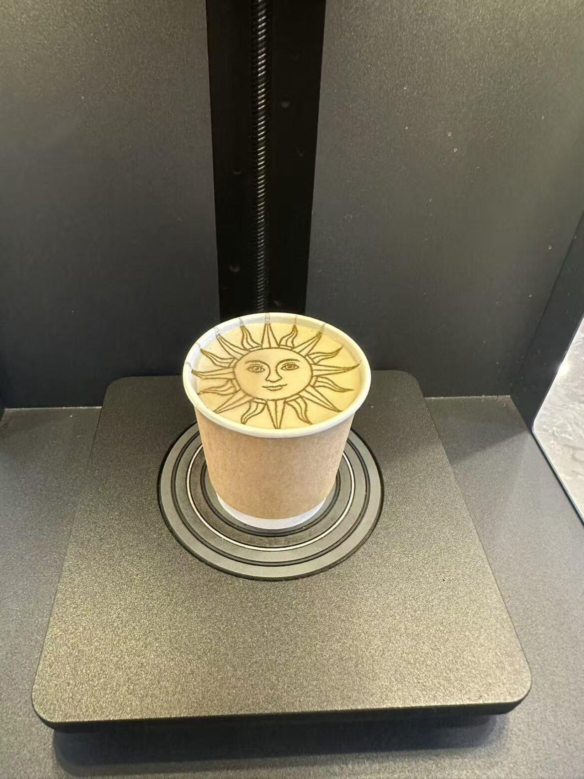 Latte art with a sun design