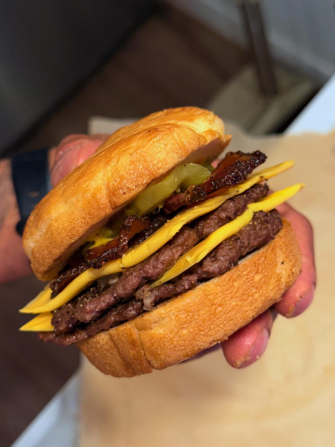 Breakfast burger with a croissant bun