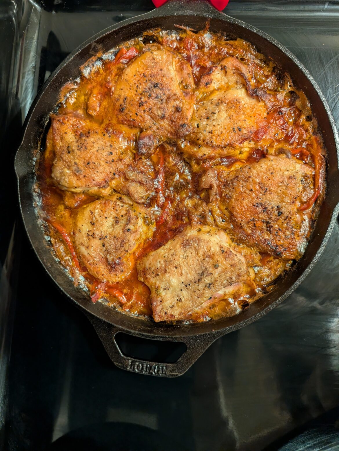 Braised chicken (thighs) with peppers and paprika