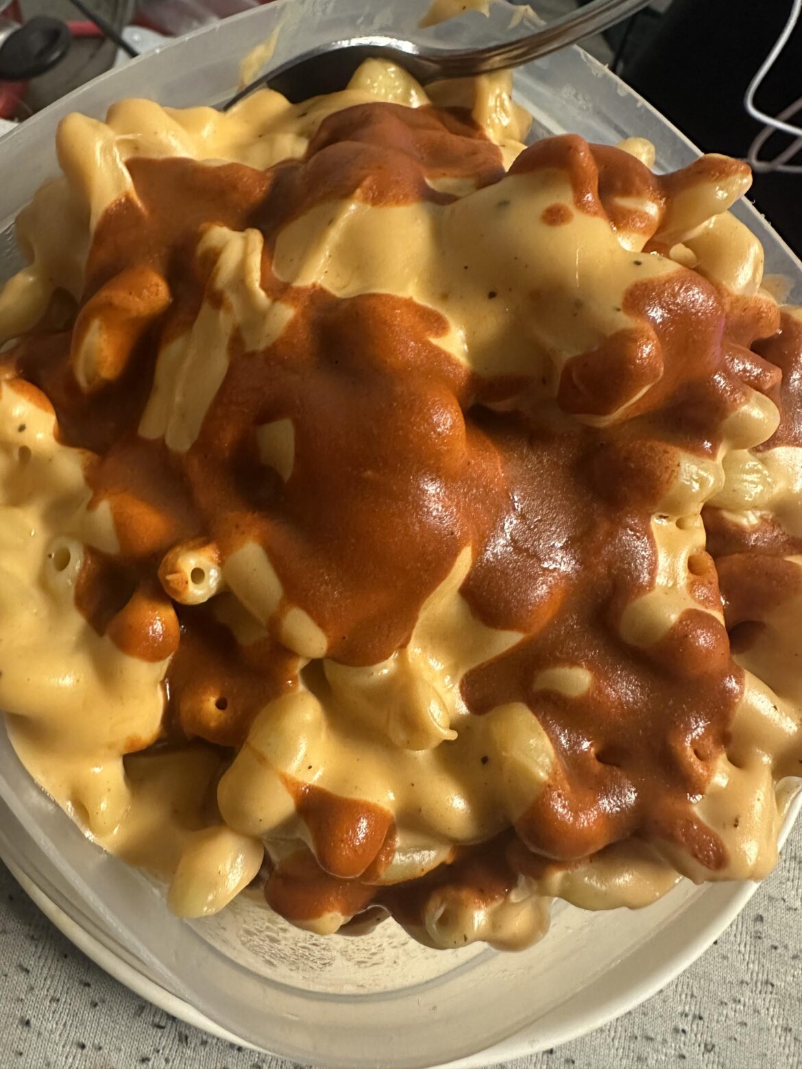 Homemade Stovetop Mac in a Tupperware. Valentina hot sauce. Heartburn 🤩
