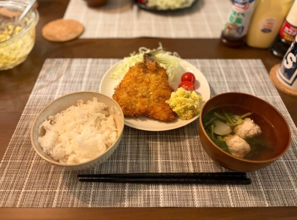 The duality of my kitchen: My husband’s handmade Aji-fry vs. My "Void" Cake 💀