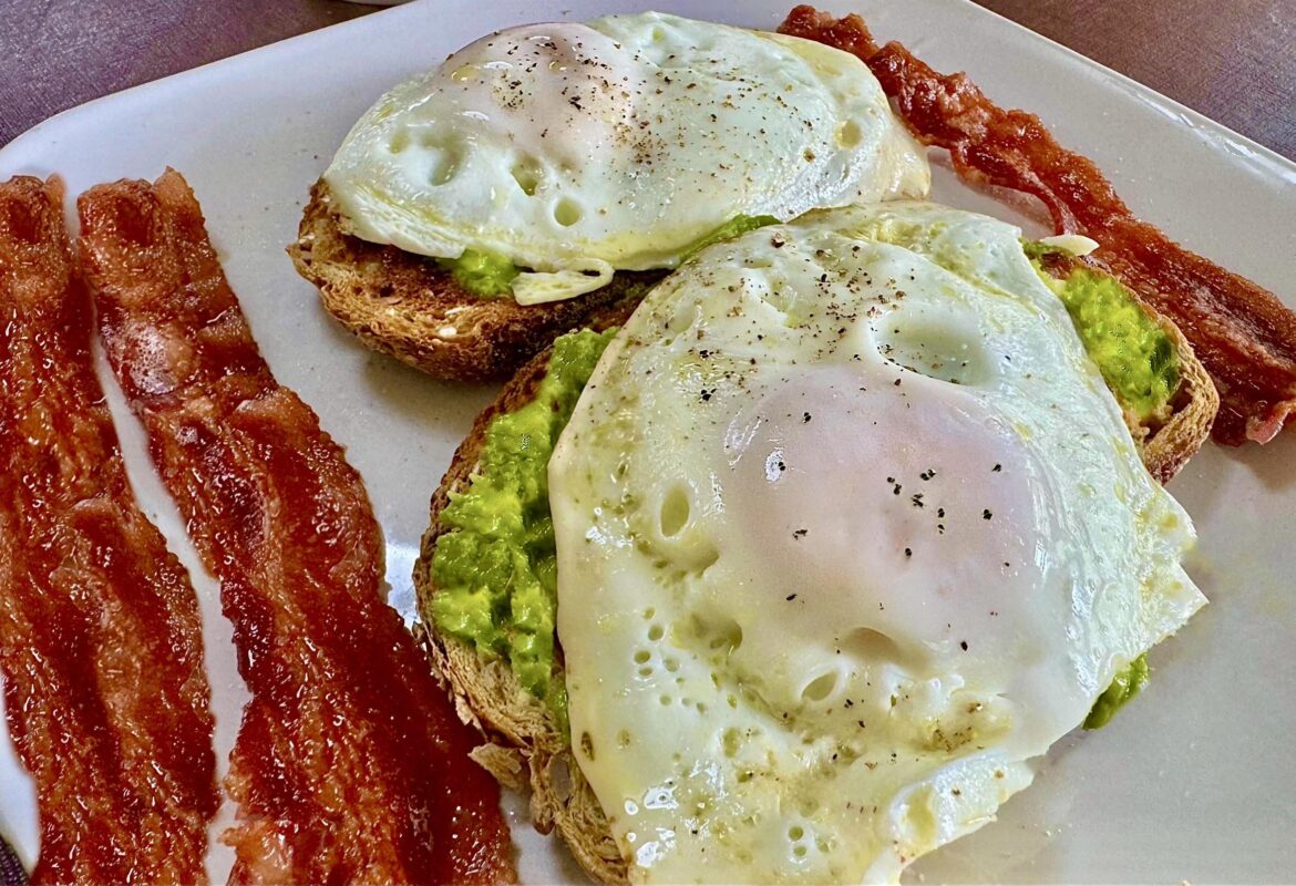 Fried eggs on avocado toast