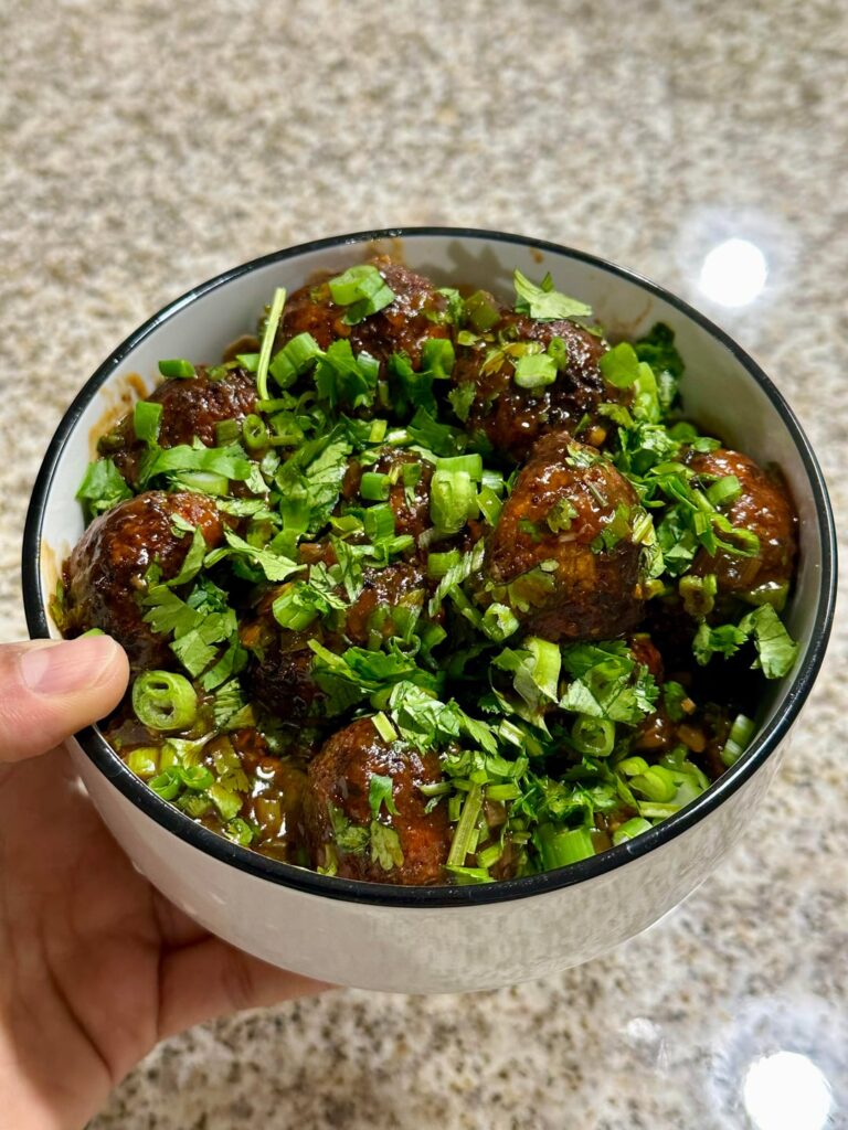 If you are vegan and haven’t tried vegetable manchurian, you are absolutely missing out (read description).