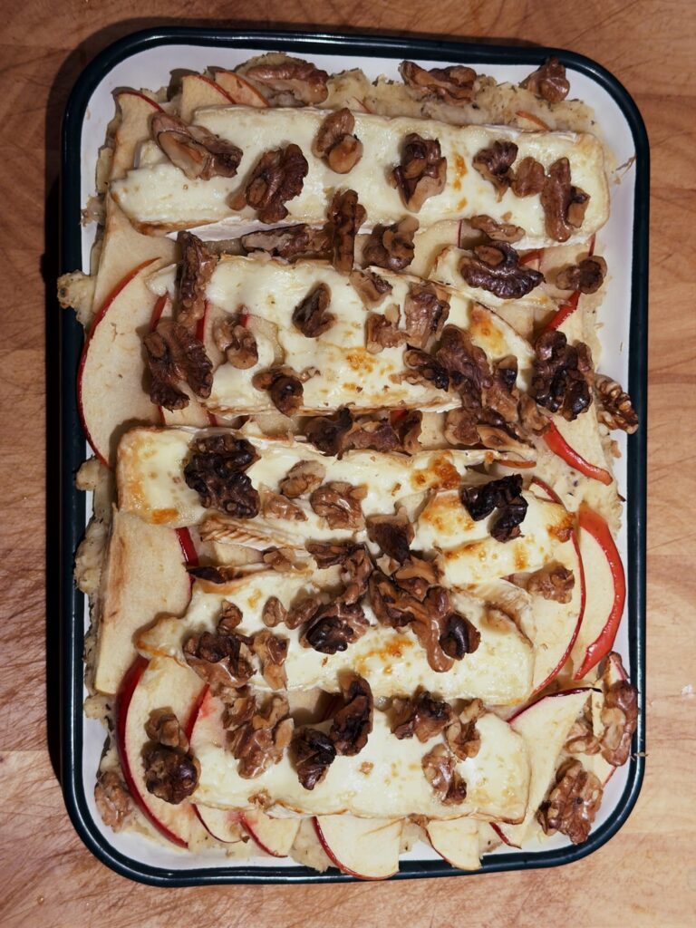 Sauerkraut mash with mustard, walnuts, apple and brie cheese