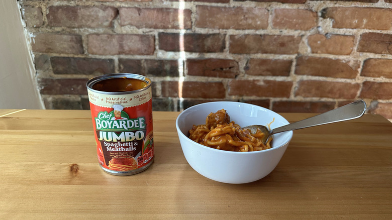 Jumbo Spaghetti and Meatballs with spoon on wooden table