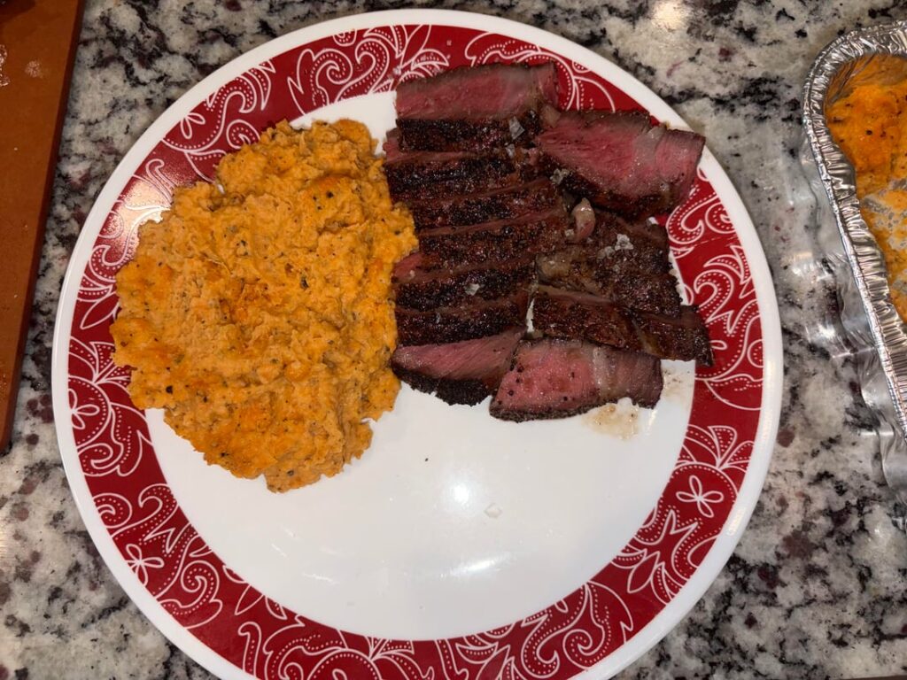Reverse seared smoked ribeye with Boursin mashed sweet potatoes.