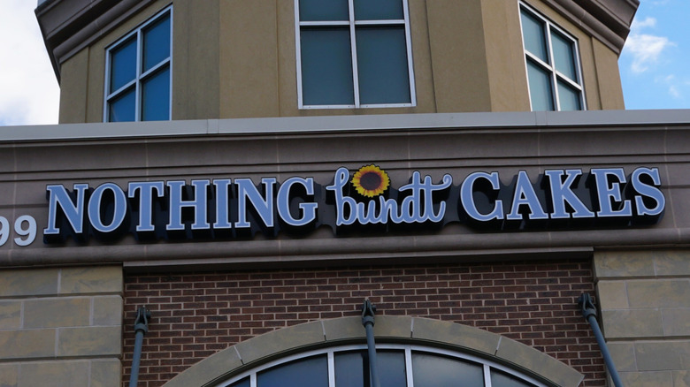 Nothing Bundt Cakes sign on stone building