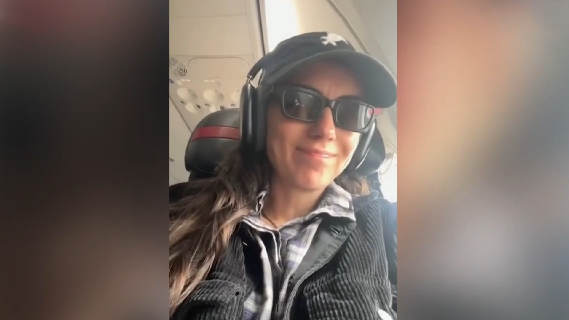 Singer caught in social media storm after posting crying baby on plane video