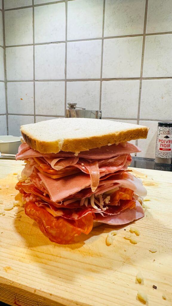 Sandwich made to use up meats before flying home