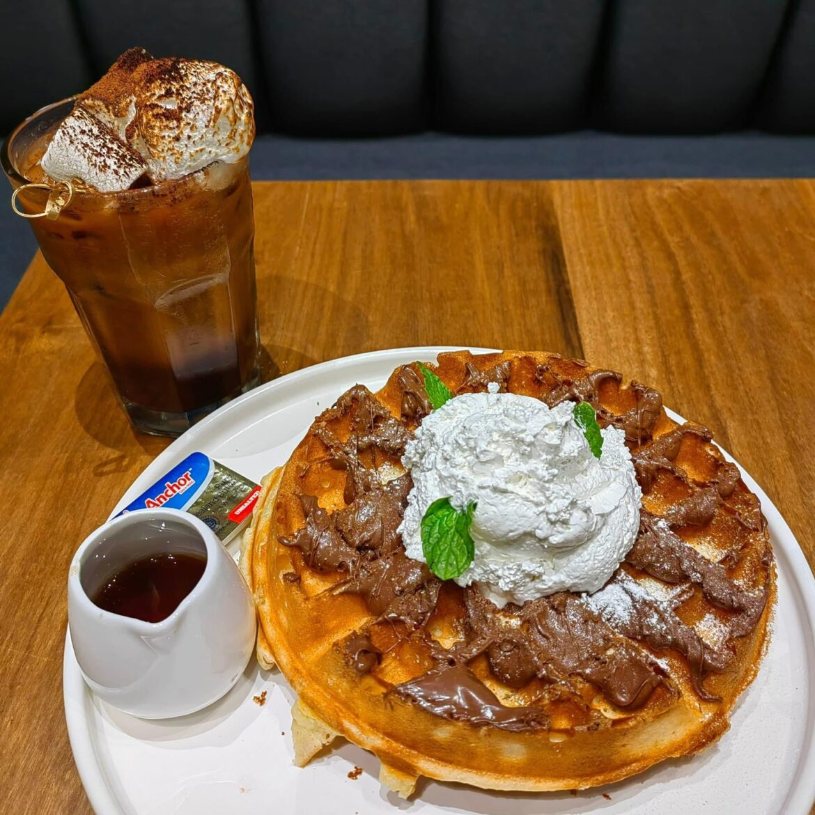 Golden waffles layered with chocolate