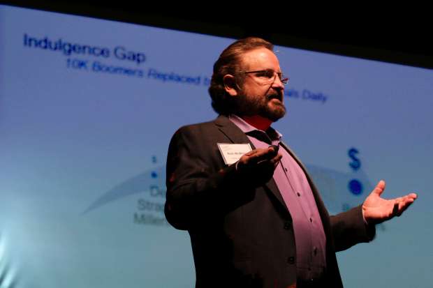 Rob McMillan, founder of Silicon Valley Bank's Premium Wine Division, speaks on wine business trends in 2018 at Sonoma County Winegrowers' Dollars and Sense Seminar and Trade Show in Santa Rosa on Jan. 11, 2018. (Jeff Quackenbush / North Bay Business Journal)