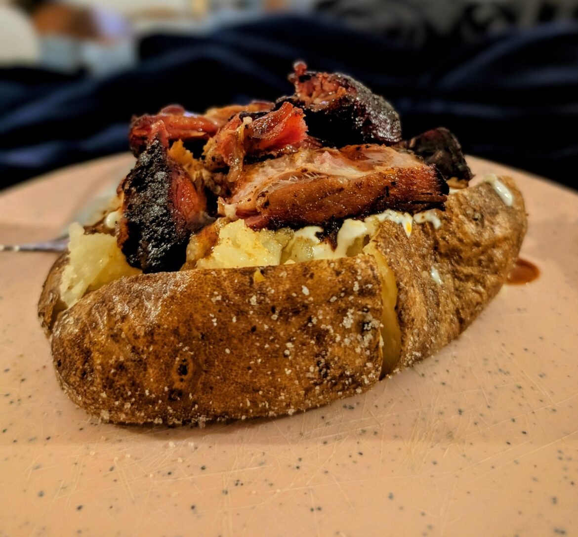 Rib tip topped baked potato