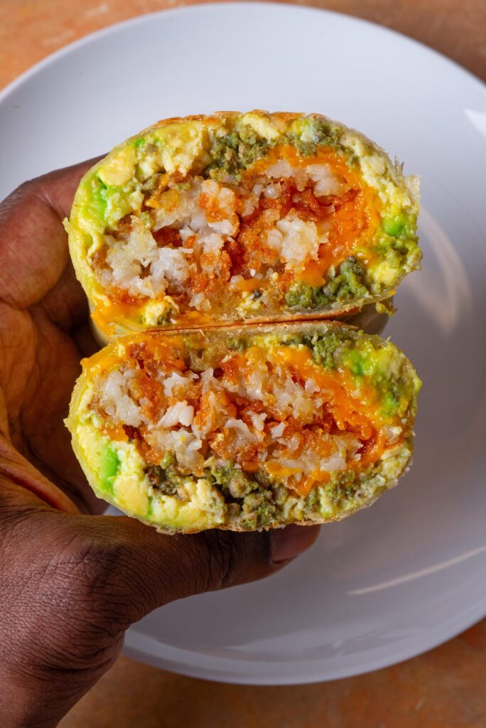 [Homemade] Breakfast burrito! Eggs, verde sausage, cheddar, hash browns, avocado and jalapeño hot sauce.