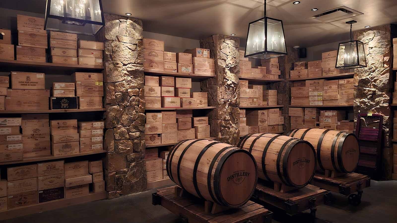 An area where newer wines are kept to age. The casks in front were from a whiskey project that put whiskey on the rails for aging.