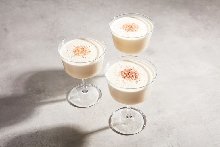 Three glasses of eggnog from Gourmet magazine garnished with grated nutmeg.