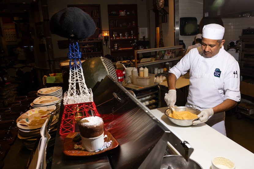 Executvie chef Alberto Solis makes the batter for the restaurant's signature Frito Chili...