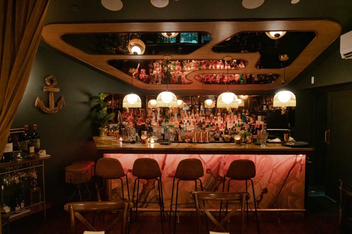 A Tuesday night at Osteria 57 in the West Village, anchored by martinis, the sea, and a legend – amNewYork