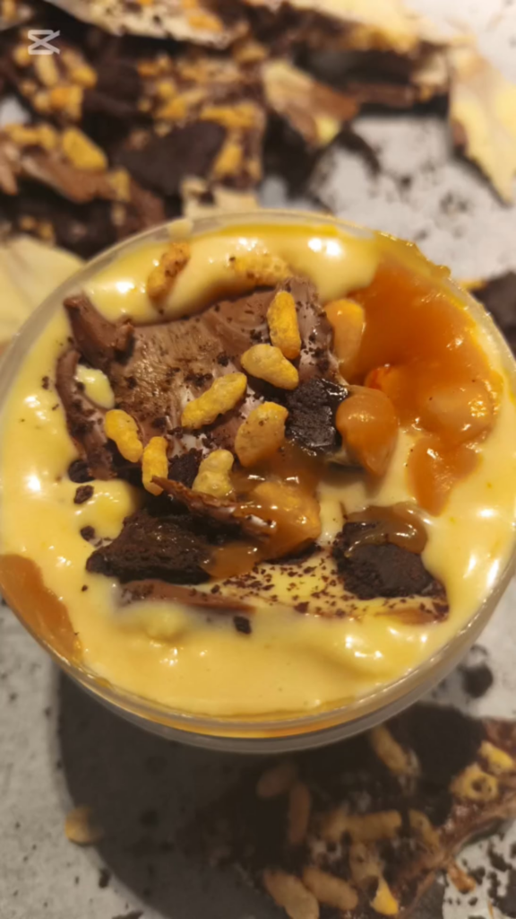 Peanut ice cream, crispy choco bark and peanut toffe Peanut ice cream, crispy choco bark and peanut toffe