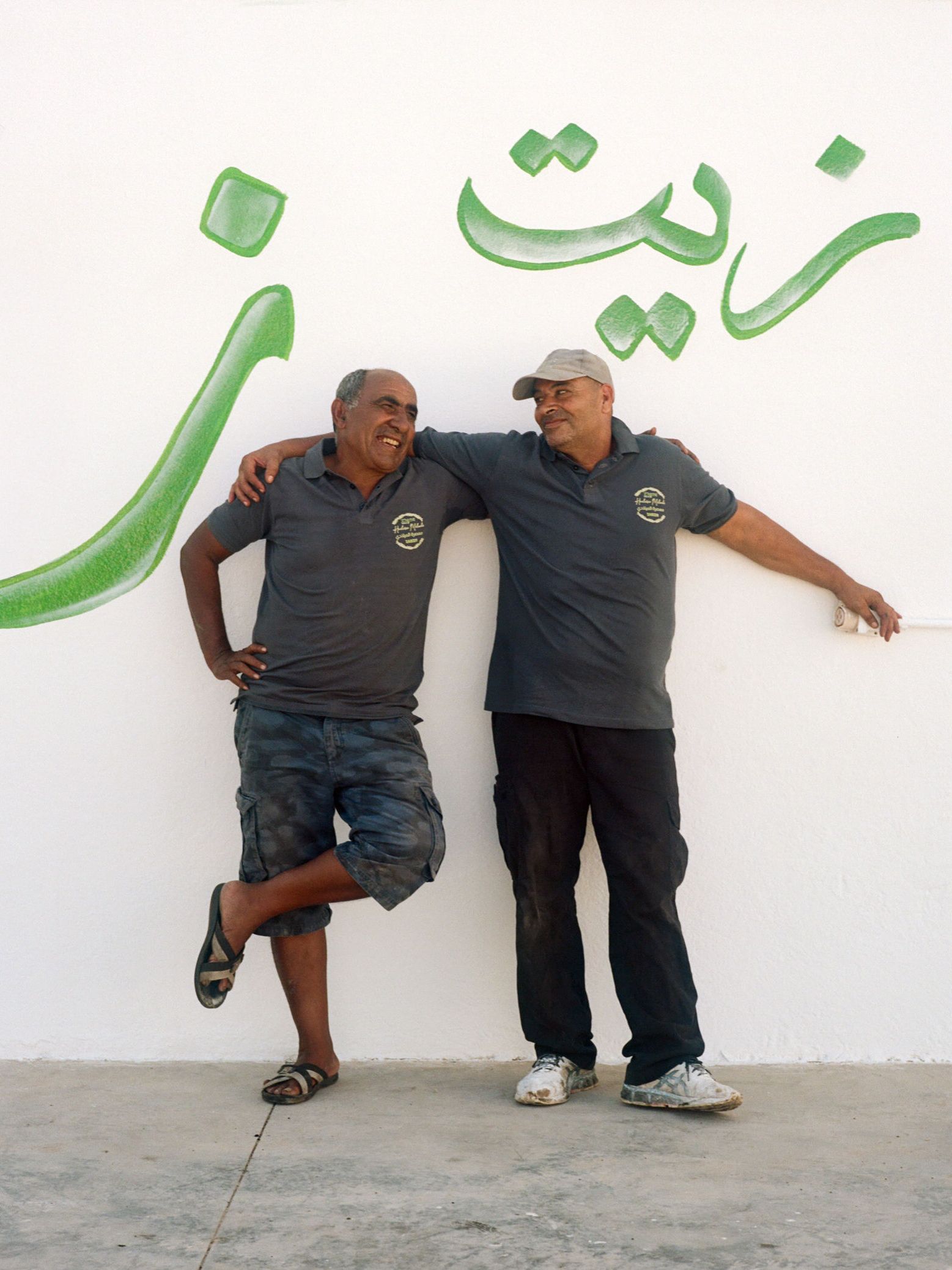 Image may contain Clothing TShirt Face Head Person Photography Portrait Footwear Shoe Pants and Shorts