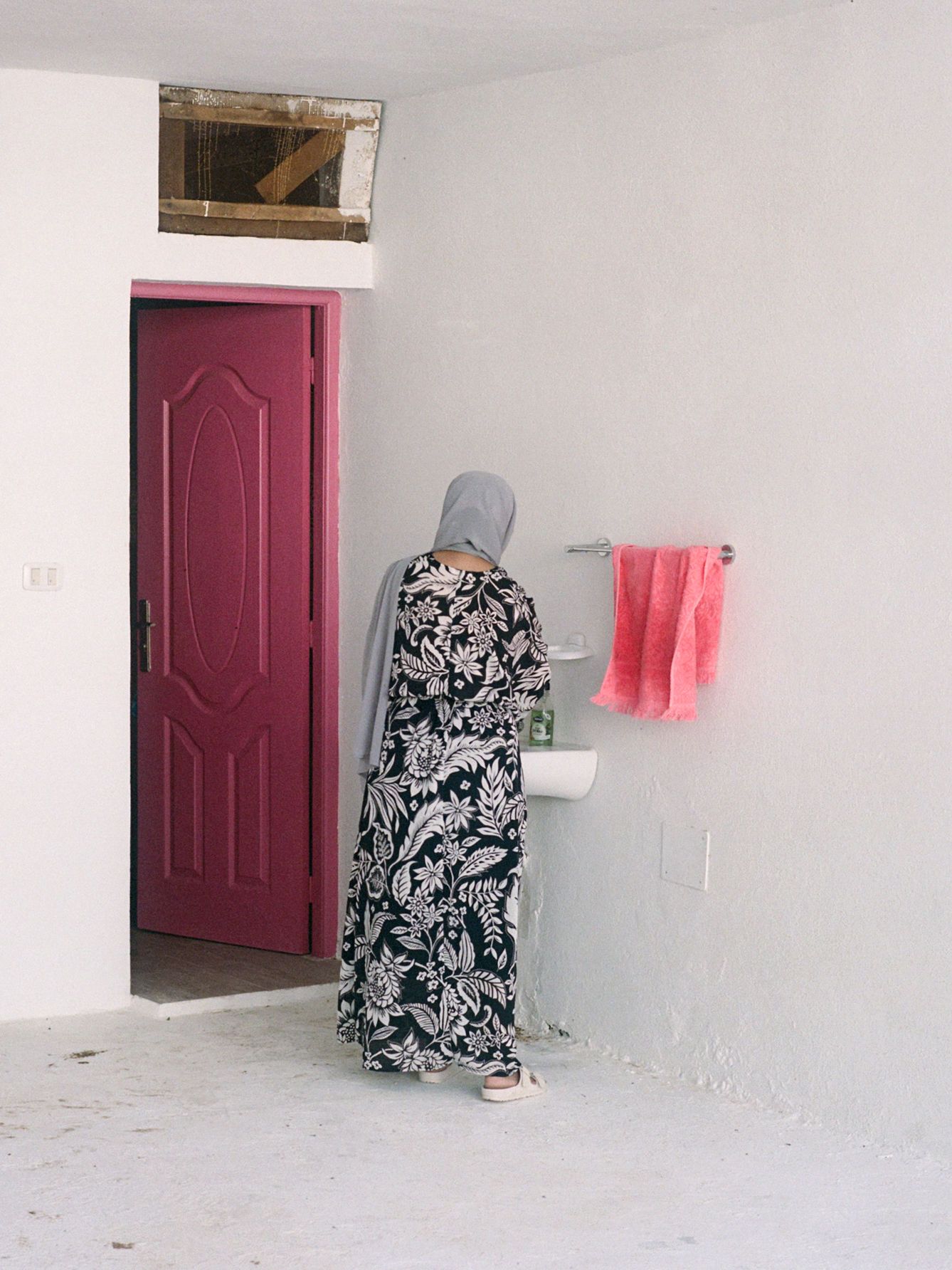 Image may contain Adult Person and Door