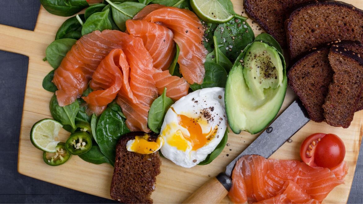 Foods included in the Nordic diet, including rye bread, salmon, eggs, and spinach