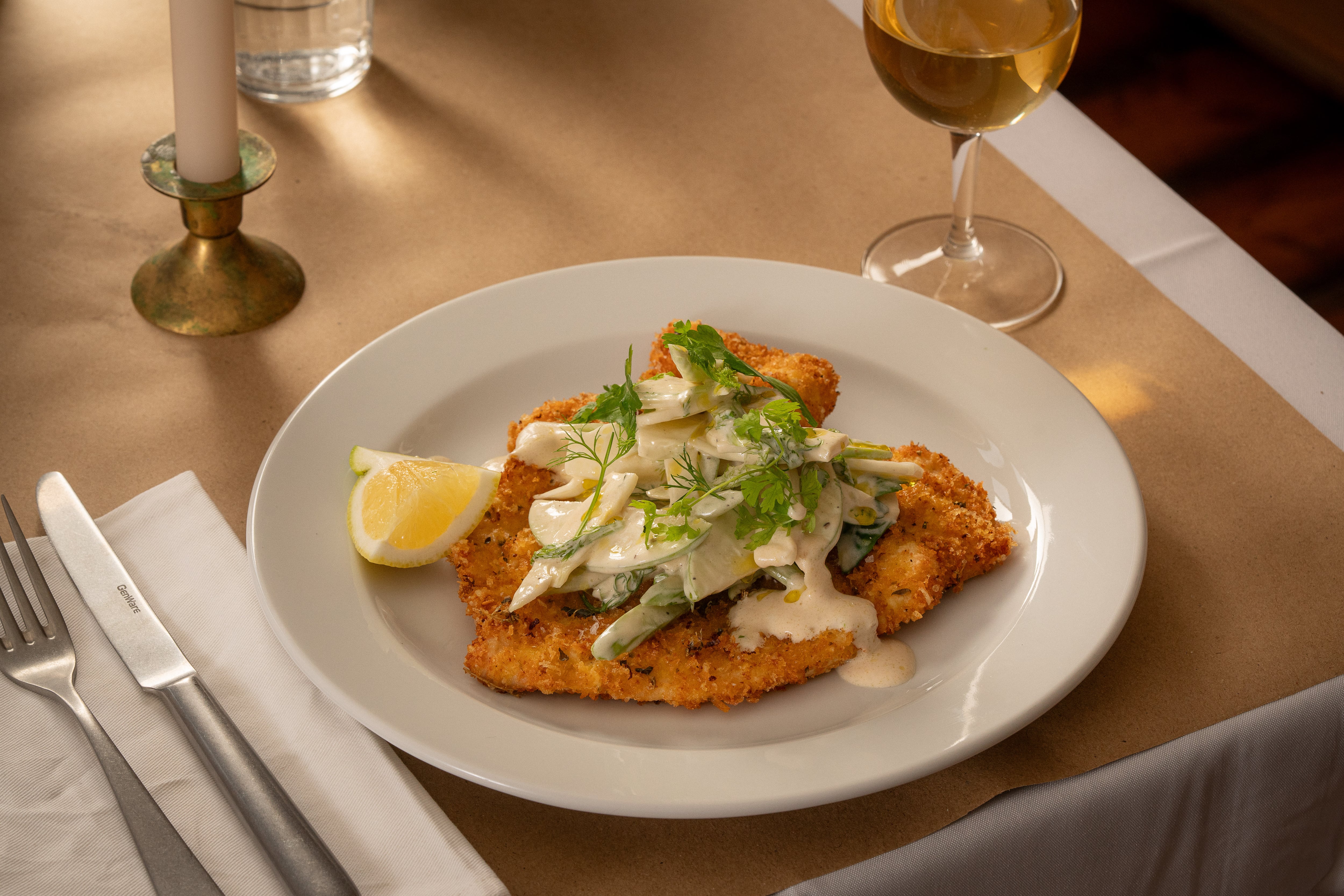 Chicken Milanese with green apple, celery, fennel, creme fraiche and fresh herbs