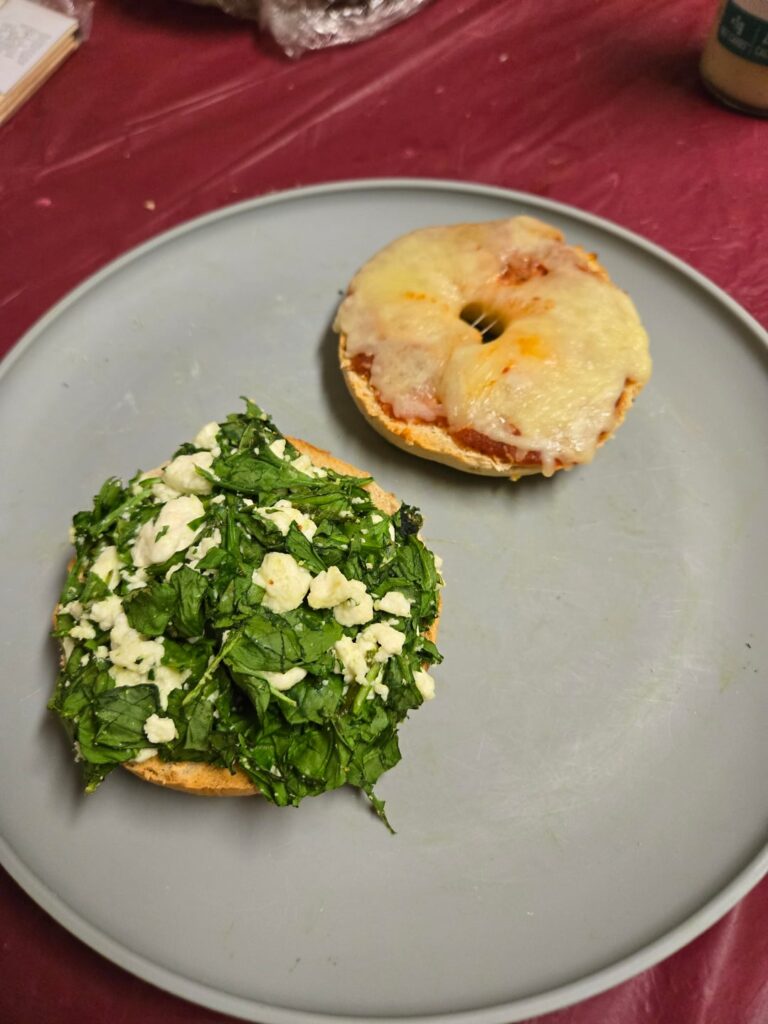 1 pizza, 1 spinach & feta bagel half - 32g fiber, 35g protein, 400 cals
