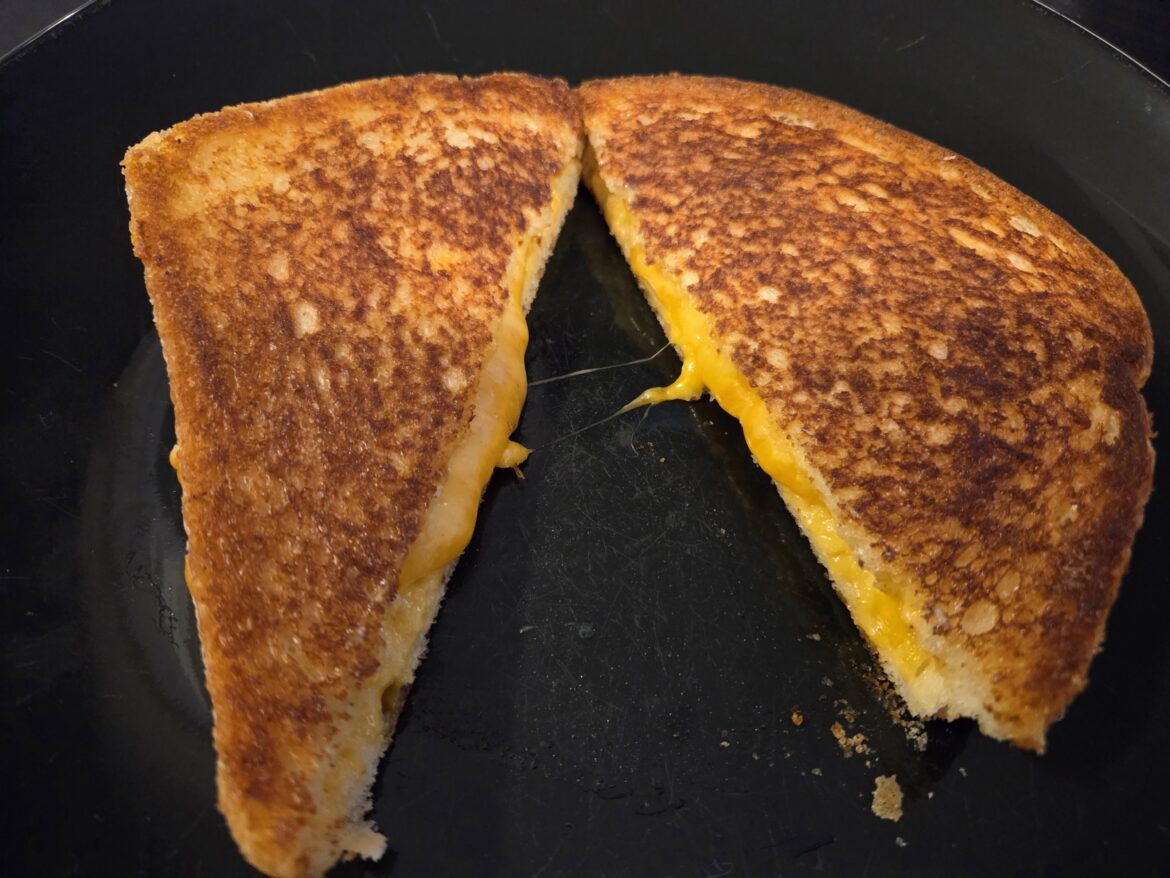 American and Medium Cheddar on Sourdough.