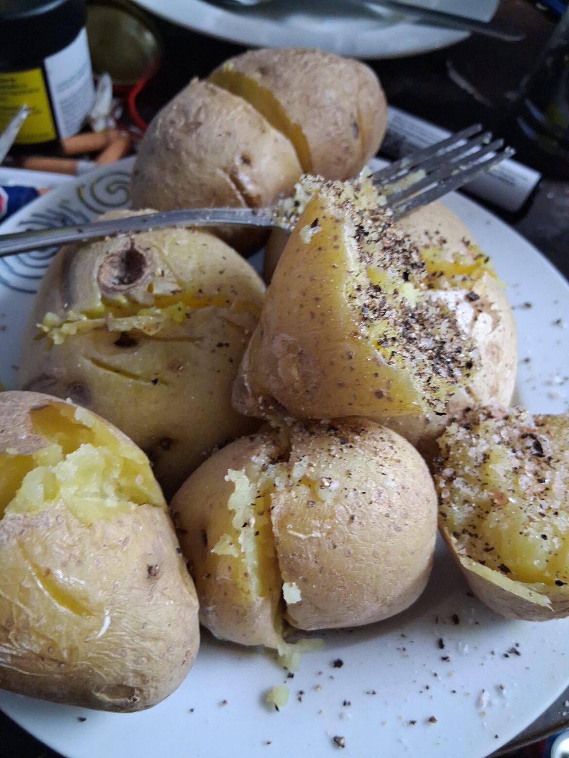 Some salt and plenty of pepper is all you really need for 6 potatoes.