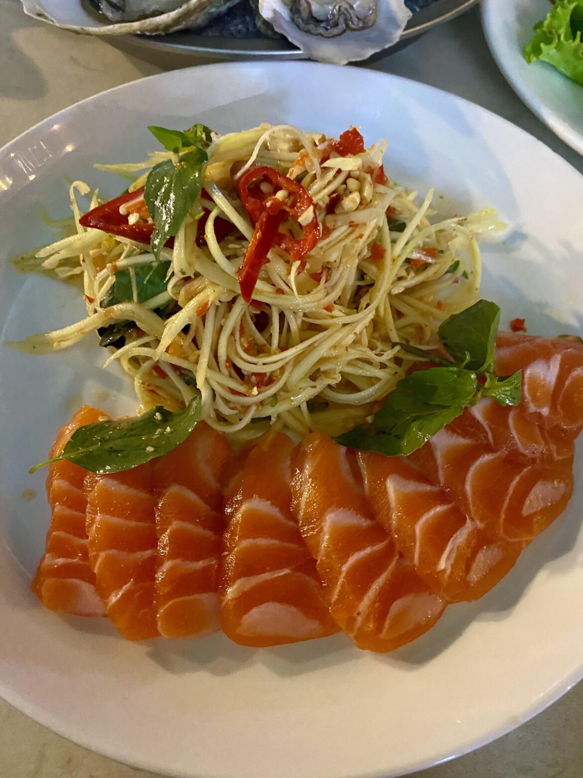 Salmon sashimi with green mango salad lunch in Cambodia 🇰🇭