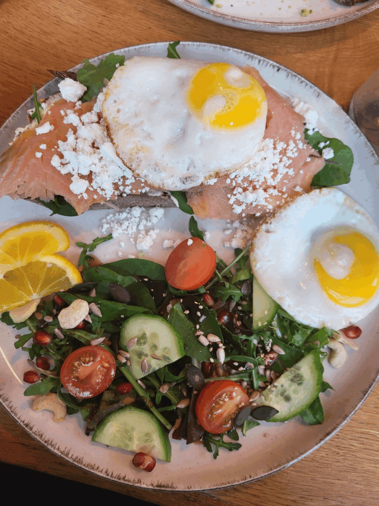 Sandwich with salmon and fried egg