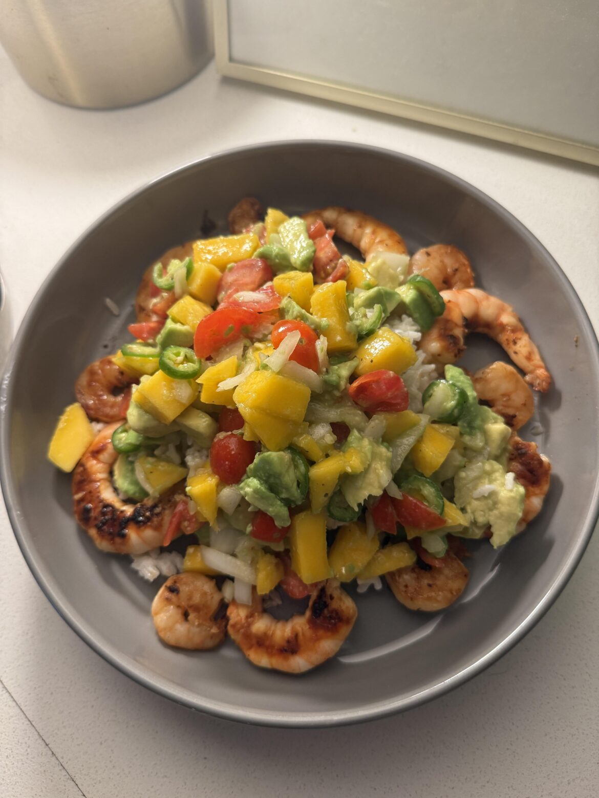 Grilled shrimp, coconut rice, and an avocado mango pico de gallo