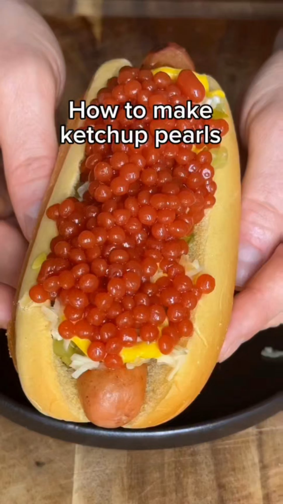 Making ketchup pearls for a hotdog???