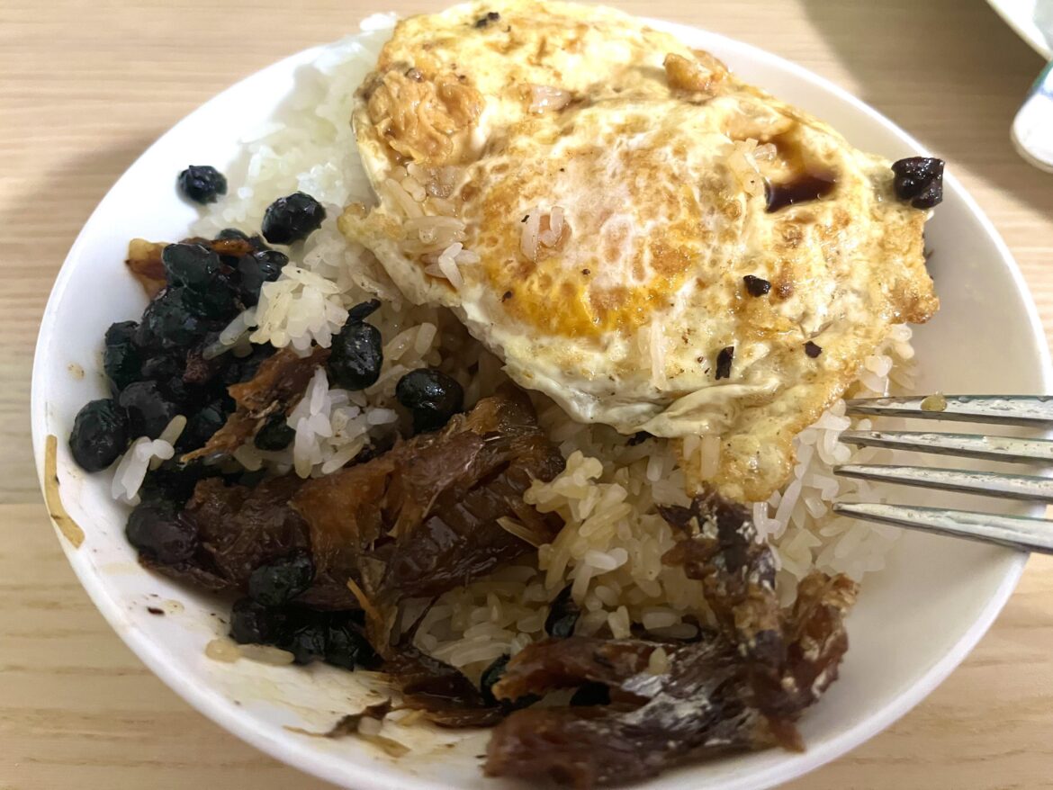 Fried dace with black bean, fried egg with soy sauce and rice.
