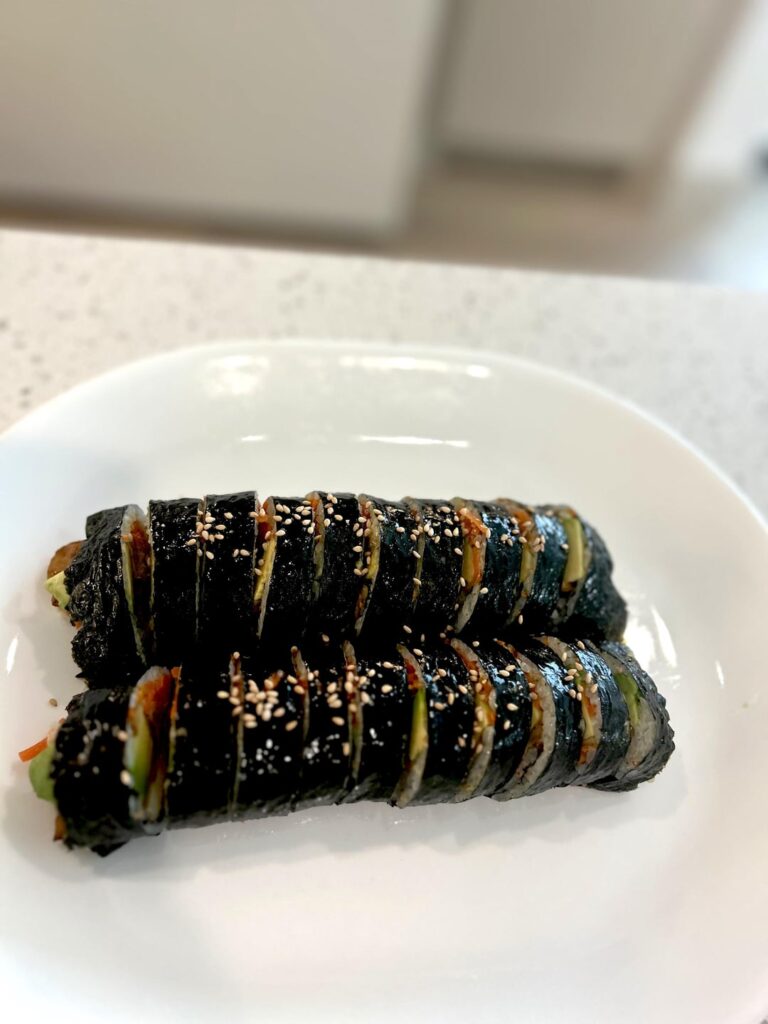 Homemade gimbap and tteokbokki after watching Culinary Class Wars on Netflix