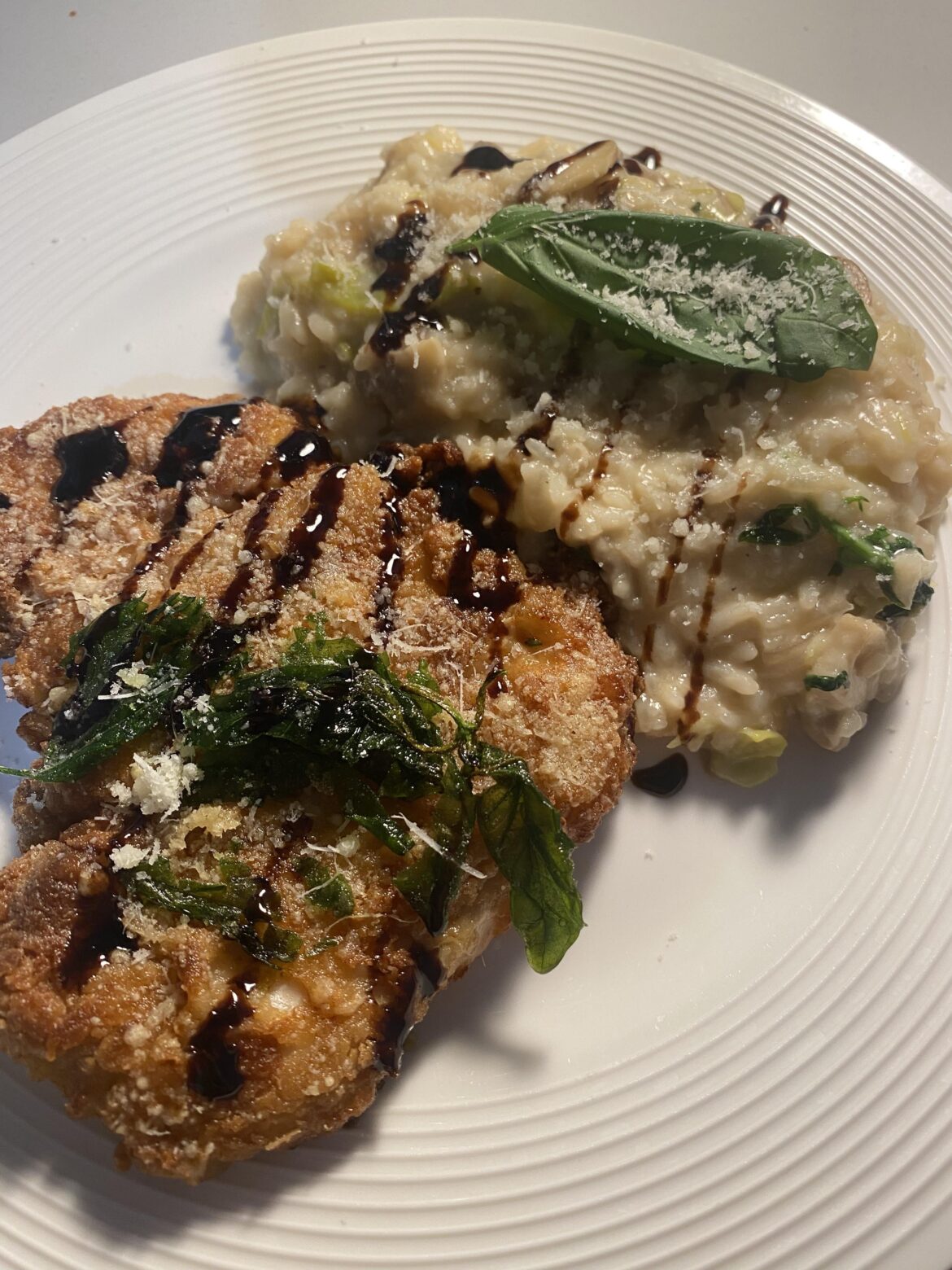 Risotto and some sort of fried chicken cutlet